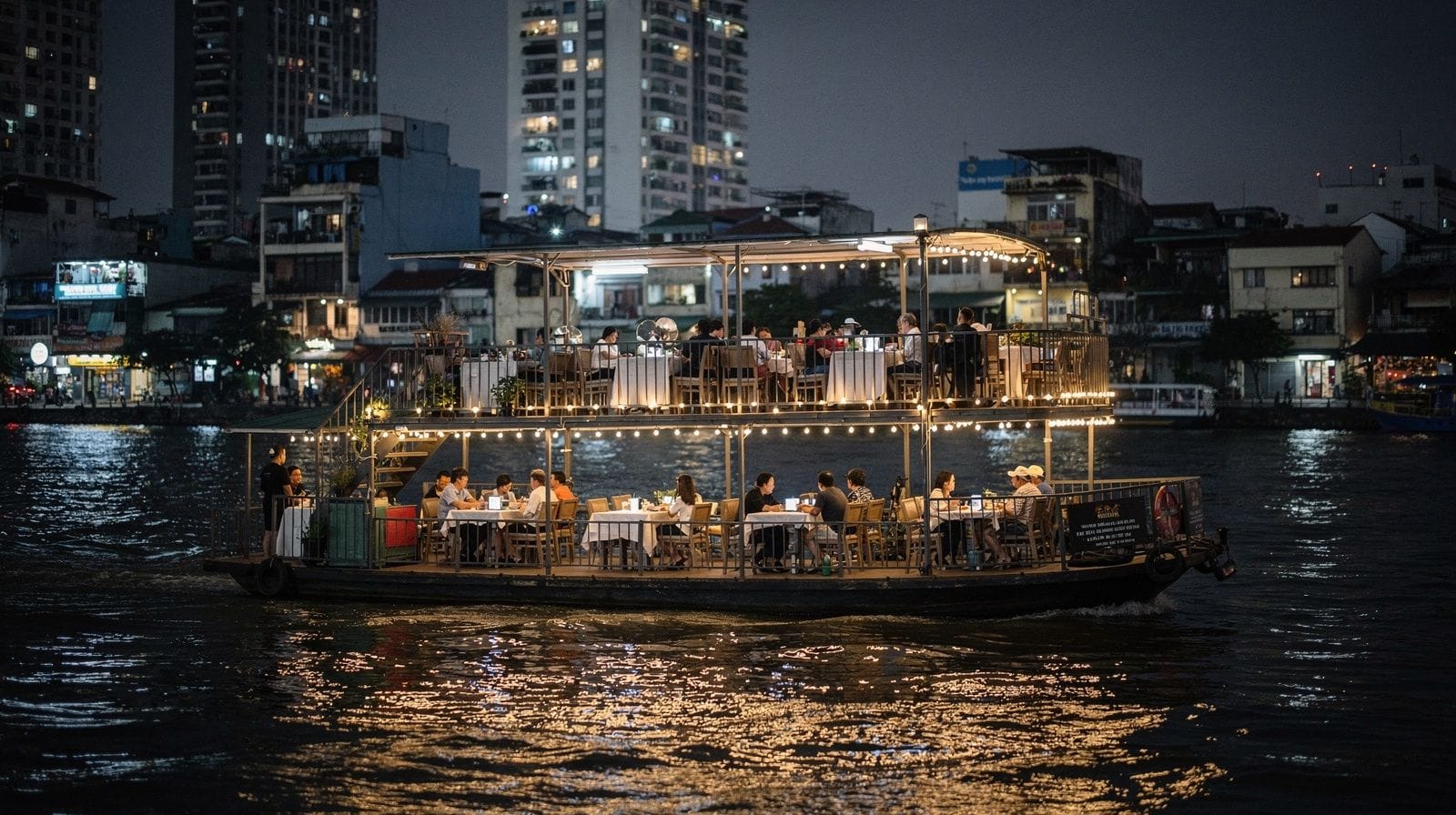 Saigon River Dinner Cruise: Onboard Dining and Night Skyline Views